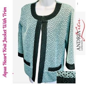 Gently Worn Andria Lieu Aqua Blue  Knit Jacket With Black Trim.